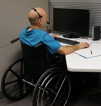 Wheelchair user at desk